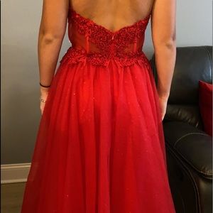 Red long gown. Never worn.